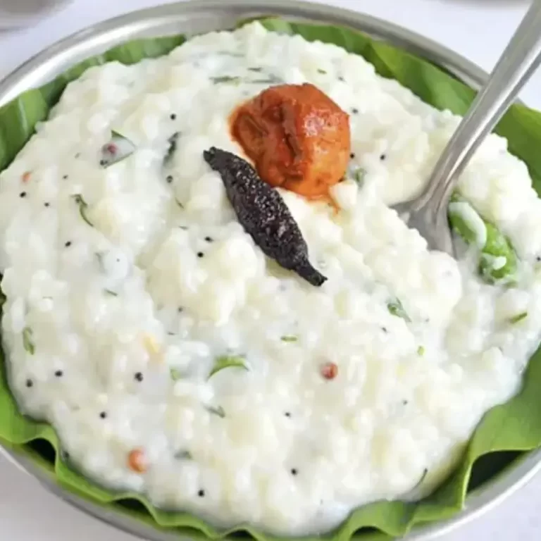 Curd rice served on banana leaf by catering services in Bangalore