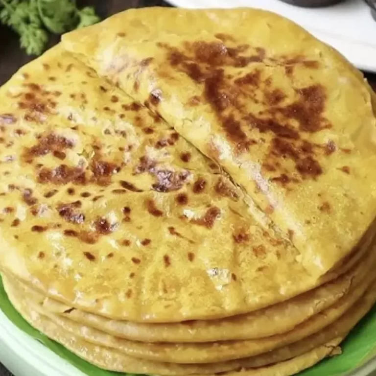 Traditional obbattu holige sweet served by catering services